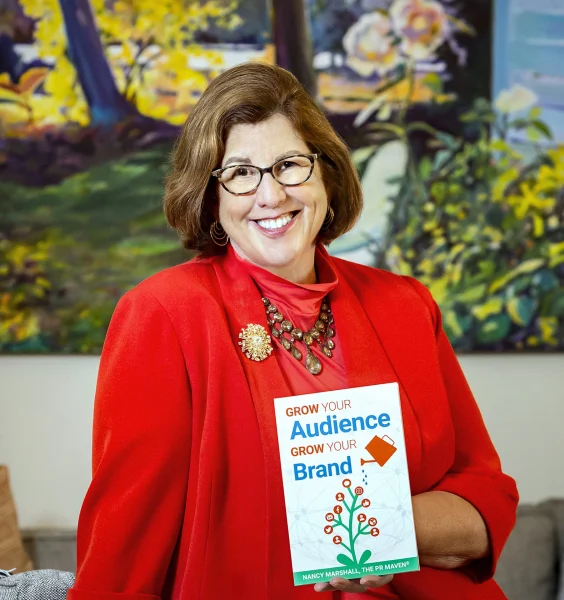 Nancy Marshall the PR Maven holding her book GYAGYB 1 Nancy Marshall the PR Maven holding her book GYAGYB 1